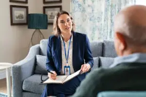 caseworker reviewing secure fax documents for a benefits determination case