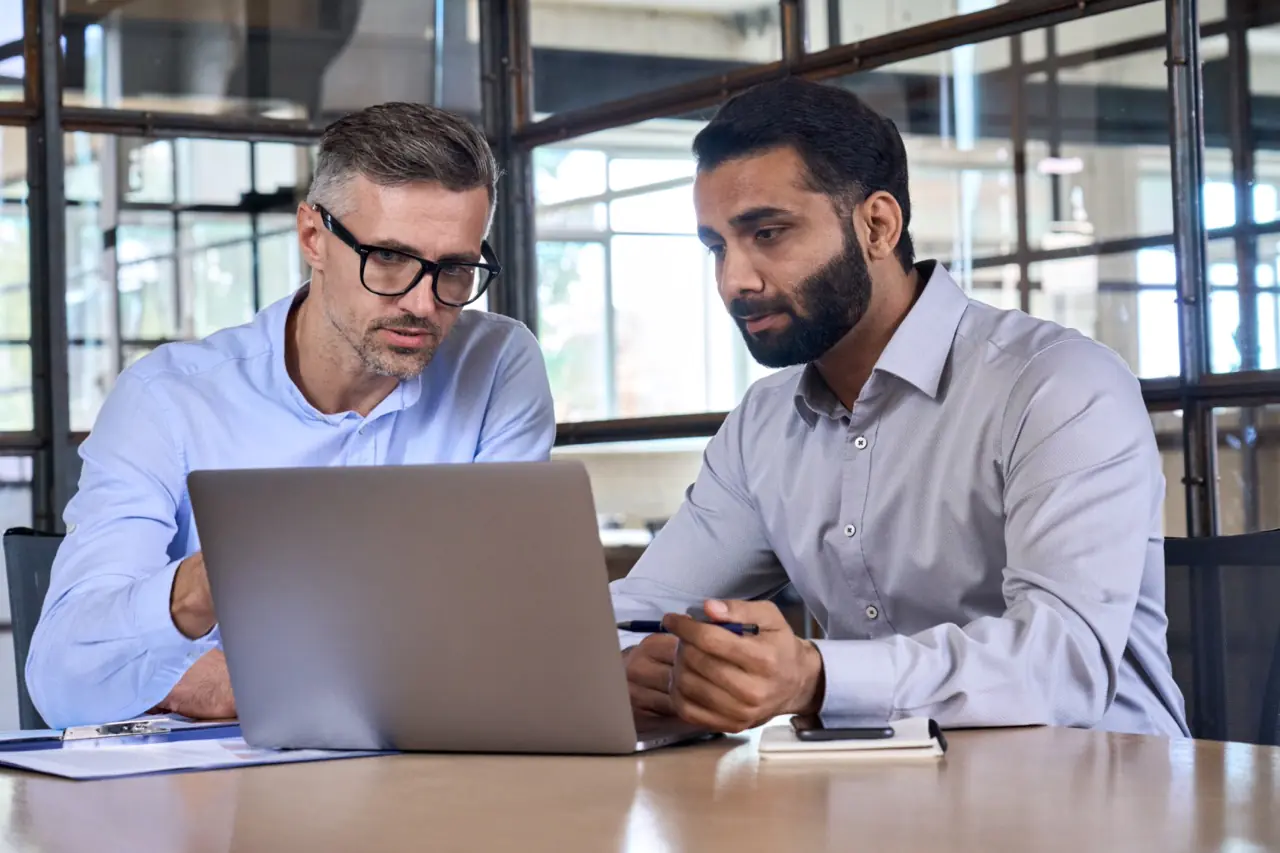 IT and procurement team auditing an enterprise fax contract before renewal
