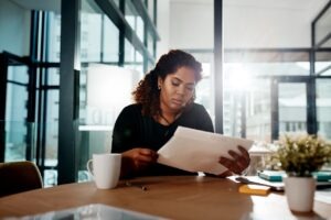 government records officer reviewing an auditable log of secure document exchanges