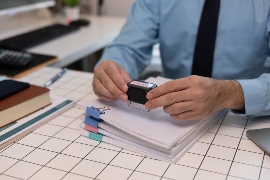 Municipal permit and licensing department staff processing high-volume document intake through cloud fax