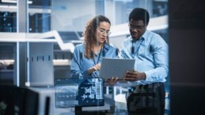 Data governance team reviewing fax transmission policies alongside other systems