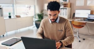 IT administrator reviewing an enterprise fax vendor management scorecard