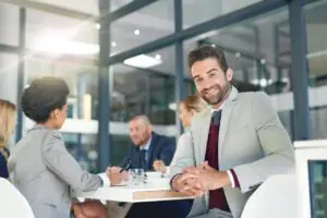 IT leader and compliance officer meeting to discuss the fax compliance conversation